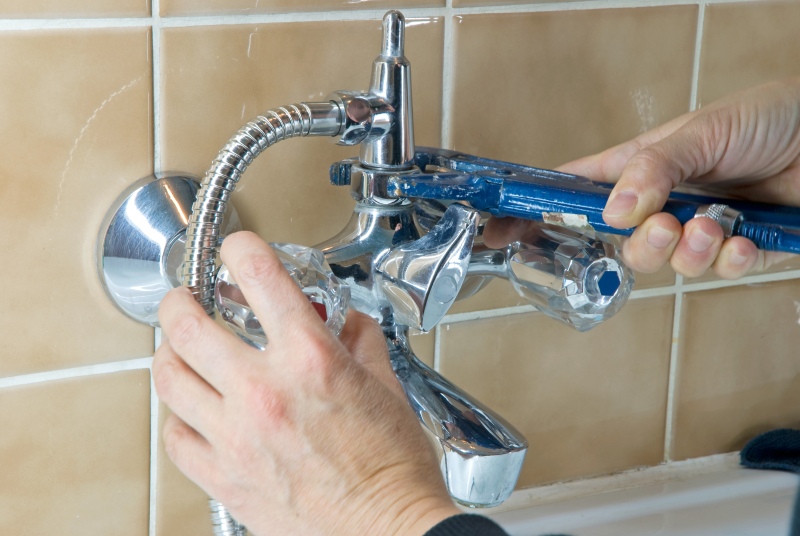 Shower being installed in a Merton bathroom
